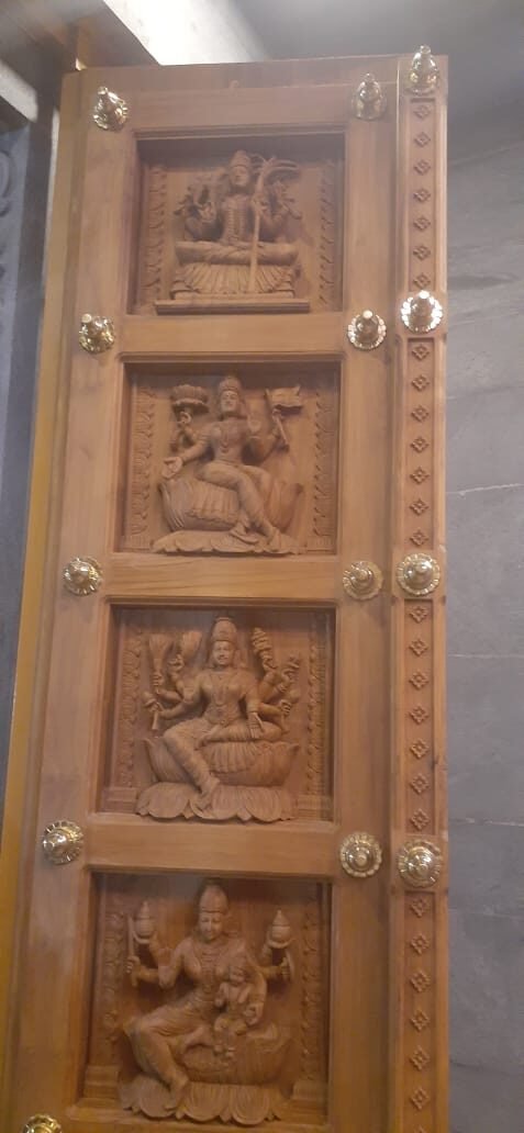 Detailed relief carving marked out on wood panel