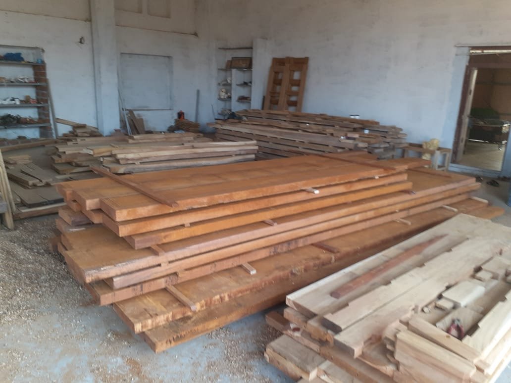 Seasoned timber stock ready for carving in the VA WoodArts workshop