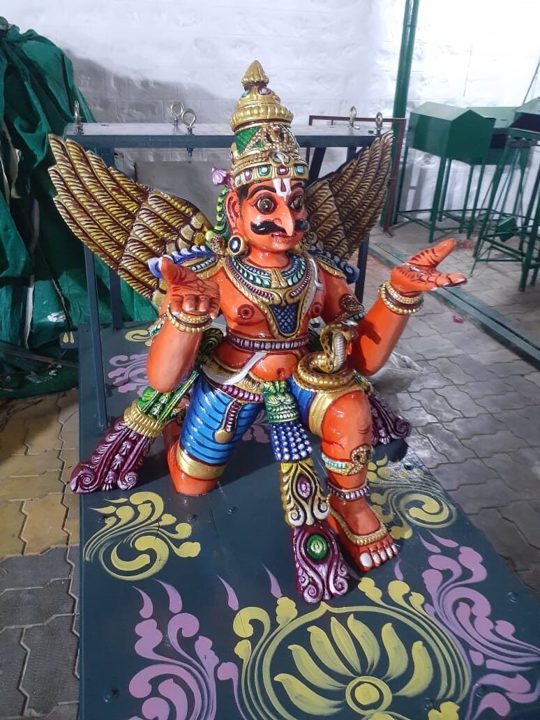 Painted Garuda sculpture in workshop